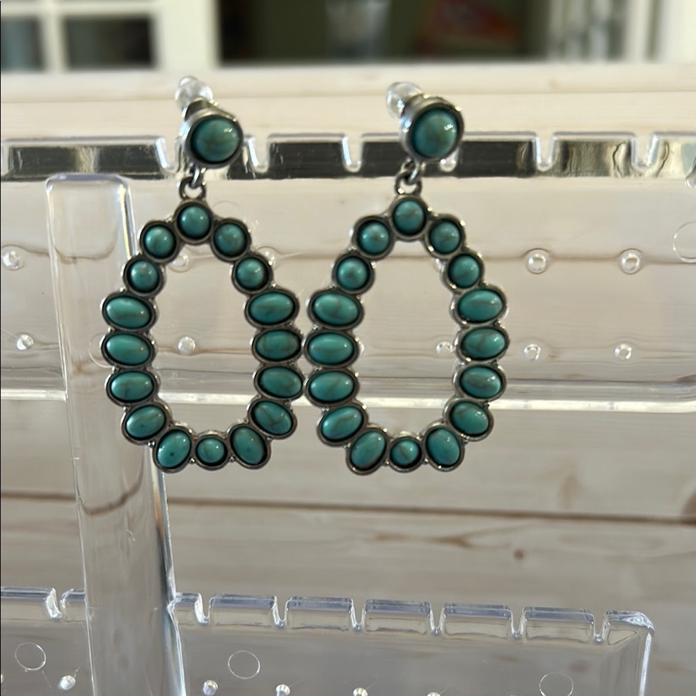 Green Teardrop Earrings with Open-Work Design